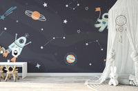 Space exploration mural with rockets and stars