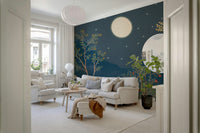 Moon and night sky wallpaper behind sofa, soft colour tones and calm styling