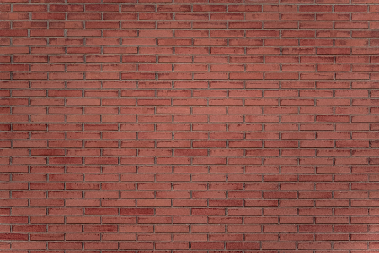 A calming terracotta pattern wallpaper mural that defines a space.

