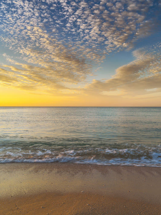 Wandbild „Sonnenaufgang am Goldenen Strand“