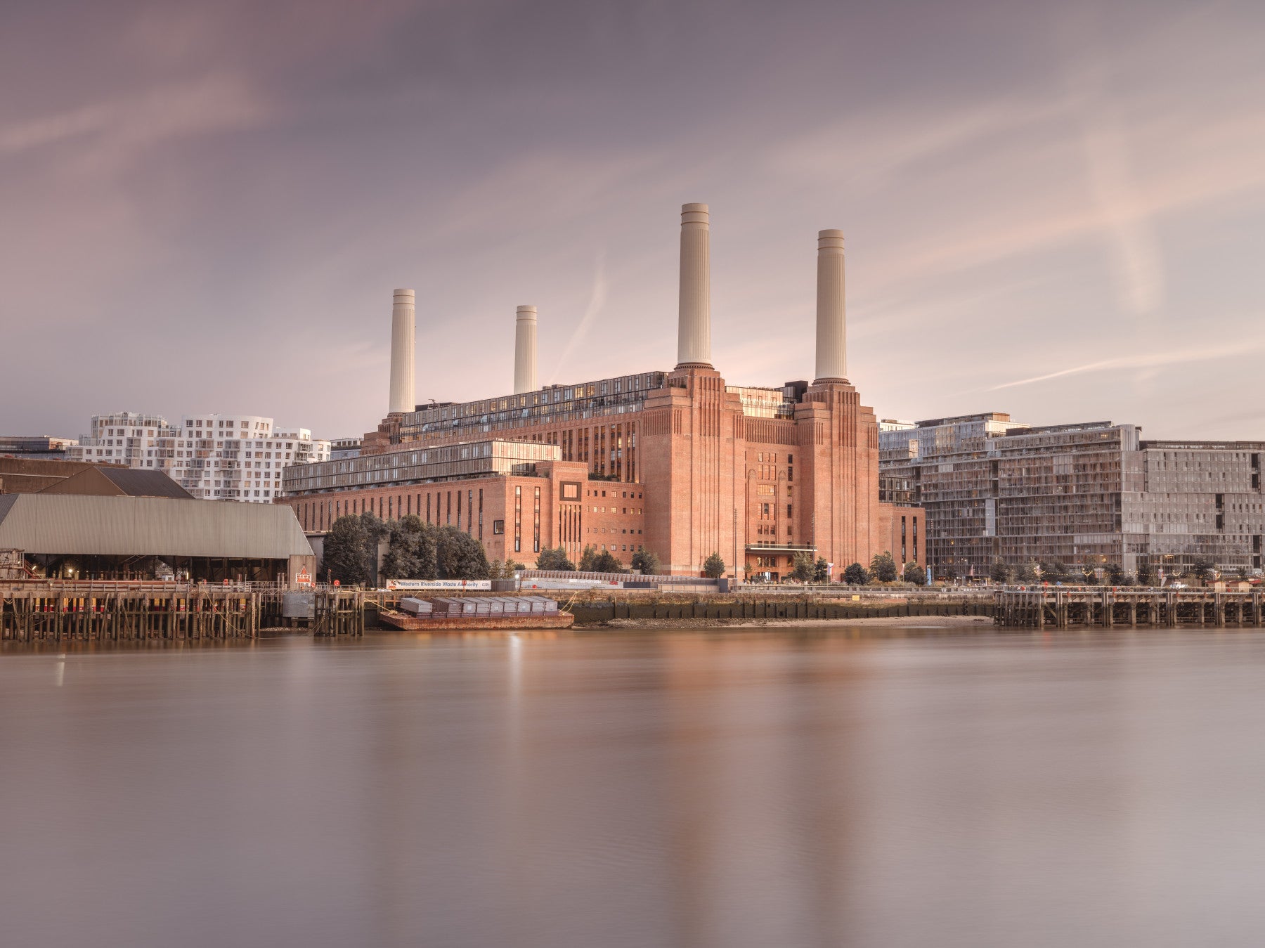 Battersea Power Station office wall mural showing sunset industrial architecture.