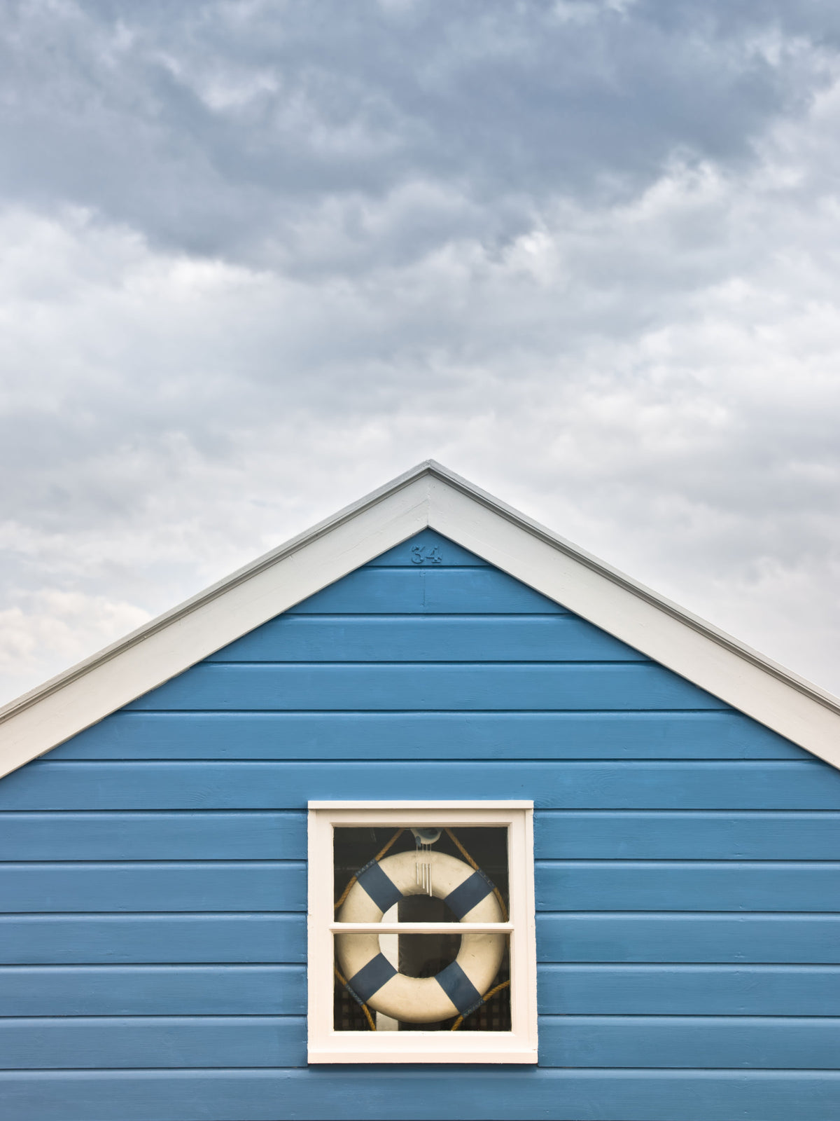Blaues Strandhäuschen: Küstencharme Wandbild in your room
