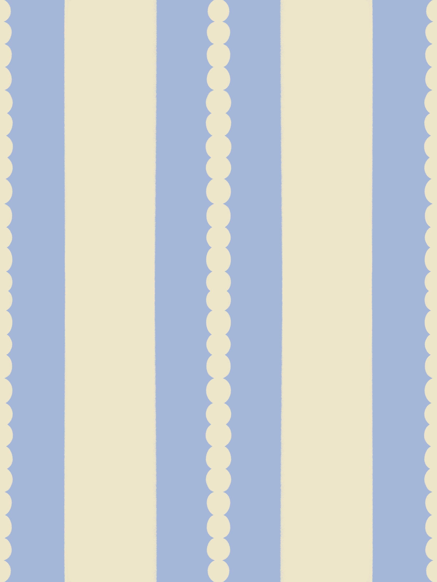 A bedroom features a vertical Scalloped Sky Stripes Wallpaper.