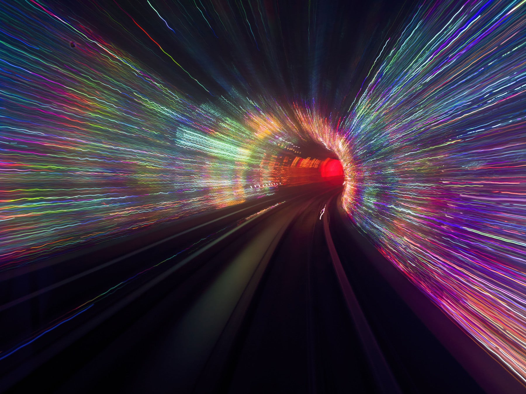 Warp Speed Lights wall mural behind a dining room and chairs