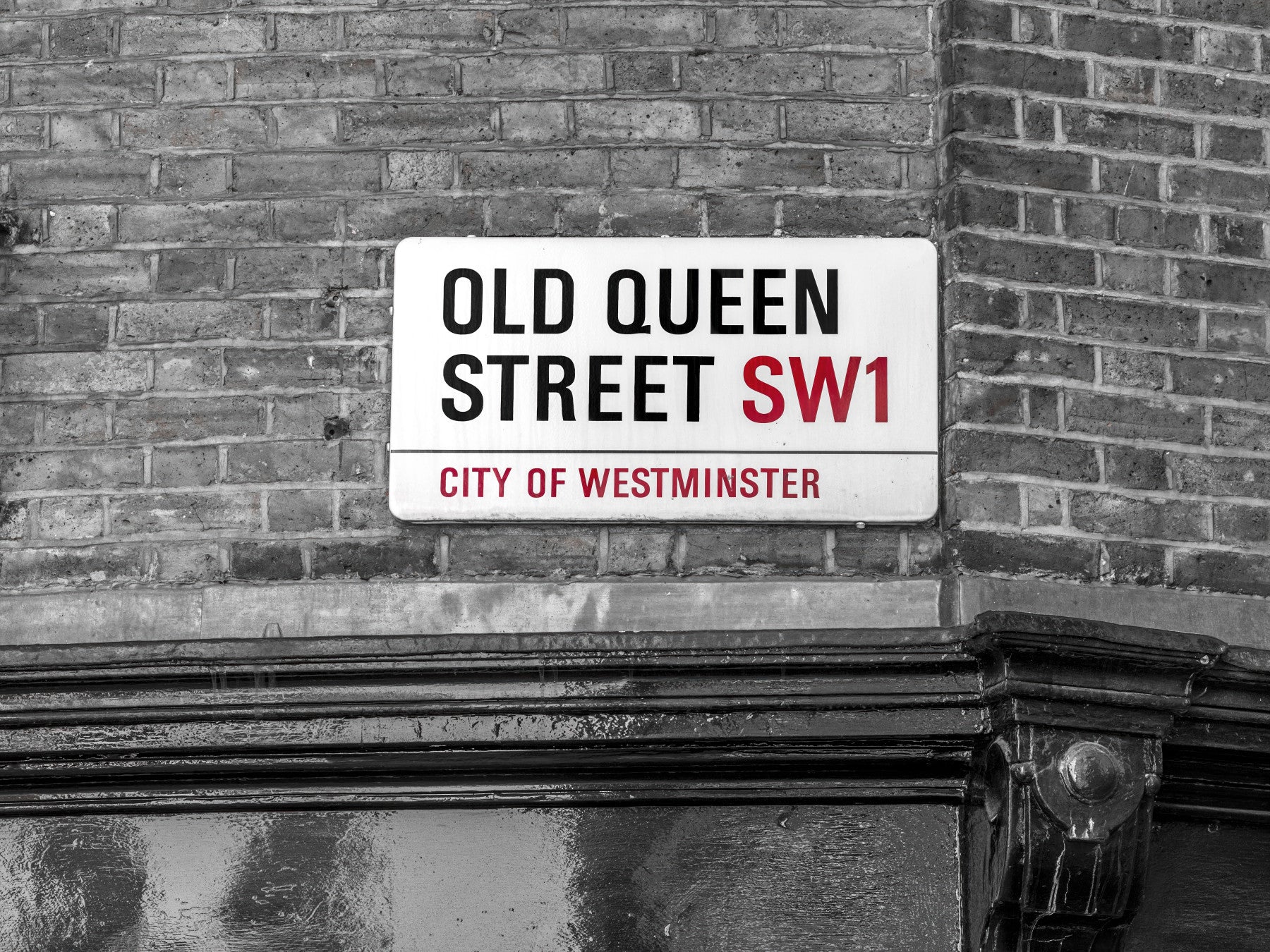 Wandbild mit Straßenschild eines Londoner Wahrzeichens