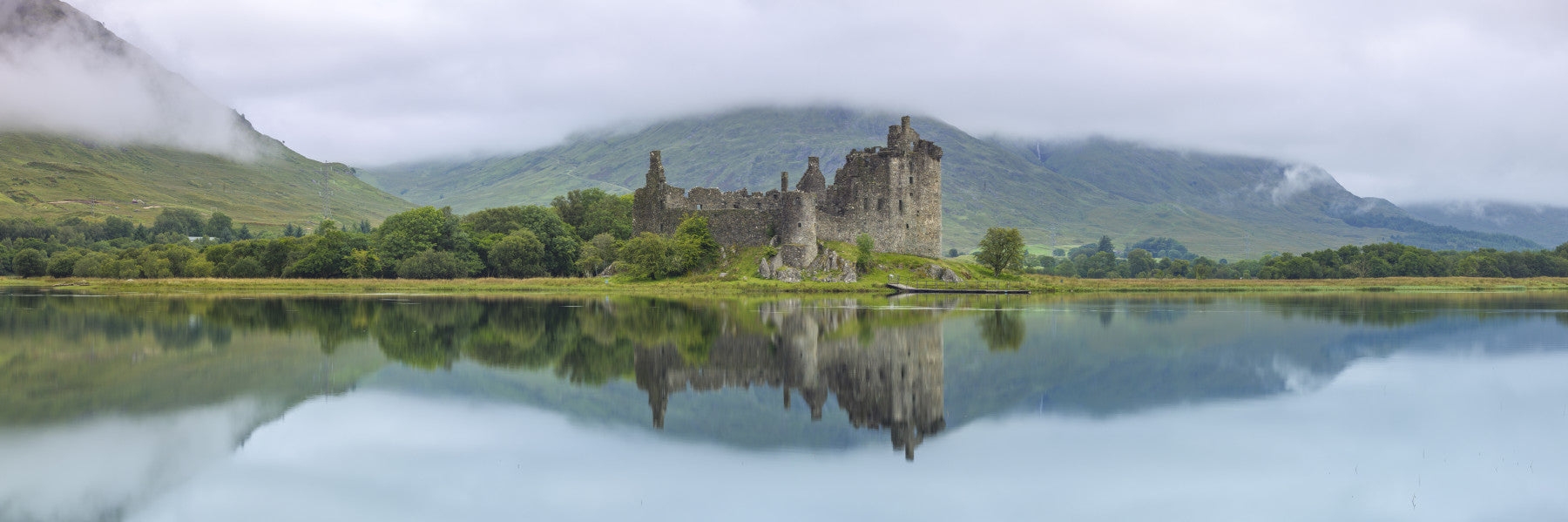 Misty Lochside Fortress Ruins Wall Mural