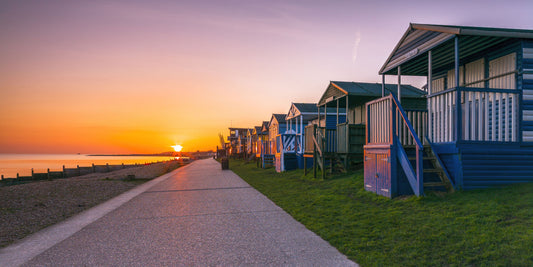 Vægmaleri med promenade i den gyldne time