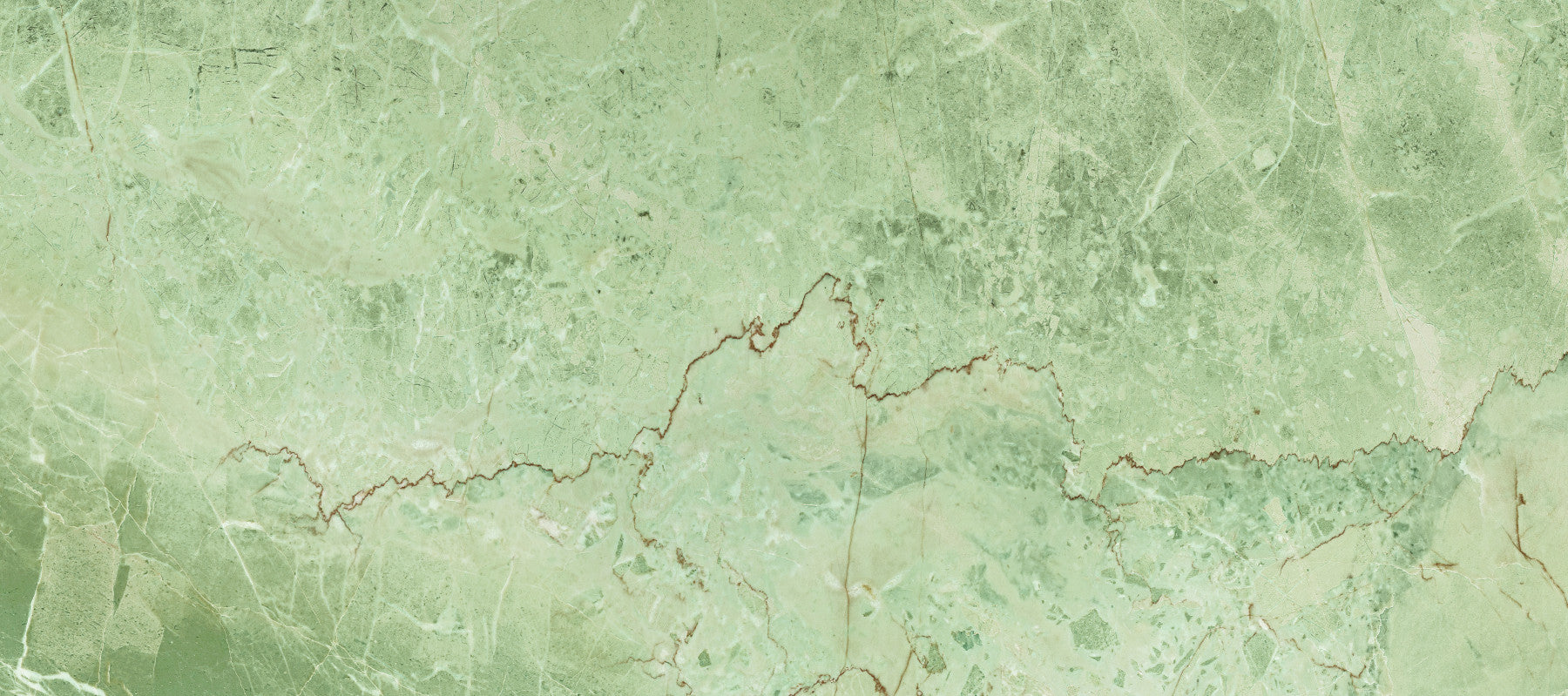 Muurbreedbeeld met marmeradertextuur in saliegroen