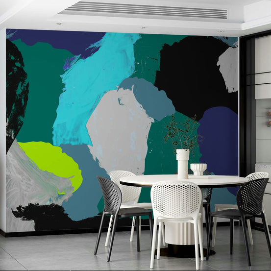 Lemon abstraction wallpaper mural with bold teal, navy and lime-green brushstrokes in a dining room with round white table