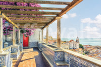 Scenic terrace Lisbon wall mural over rooftops and florals.