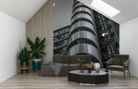  Building Futuristic design wall mural, numerous ducts and vents ascend toward bright sky background.