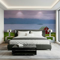 Peaceful coastal wall mural with grassy land