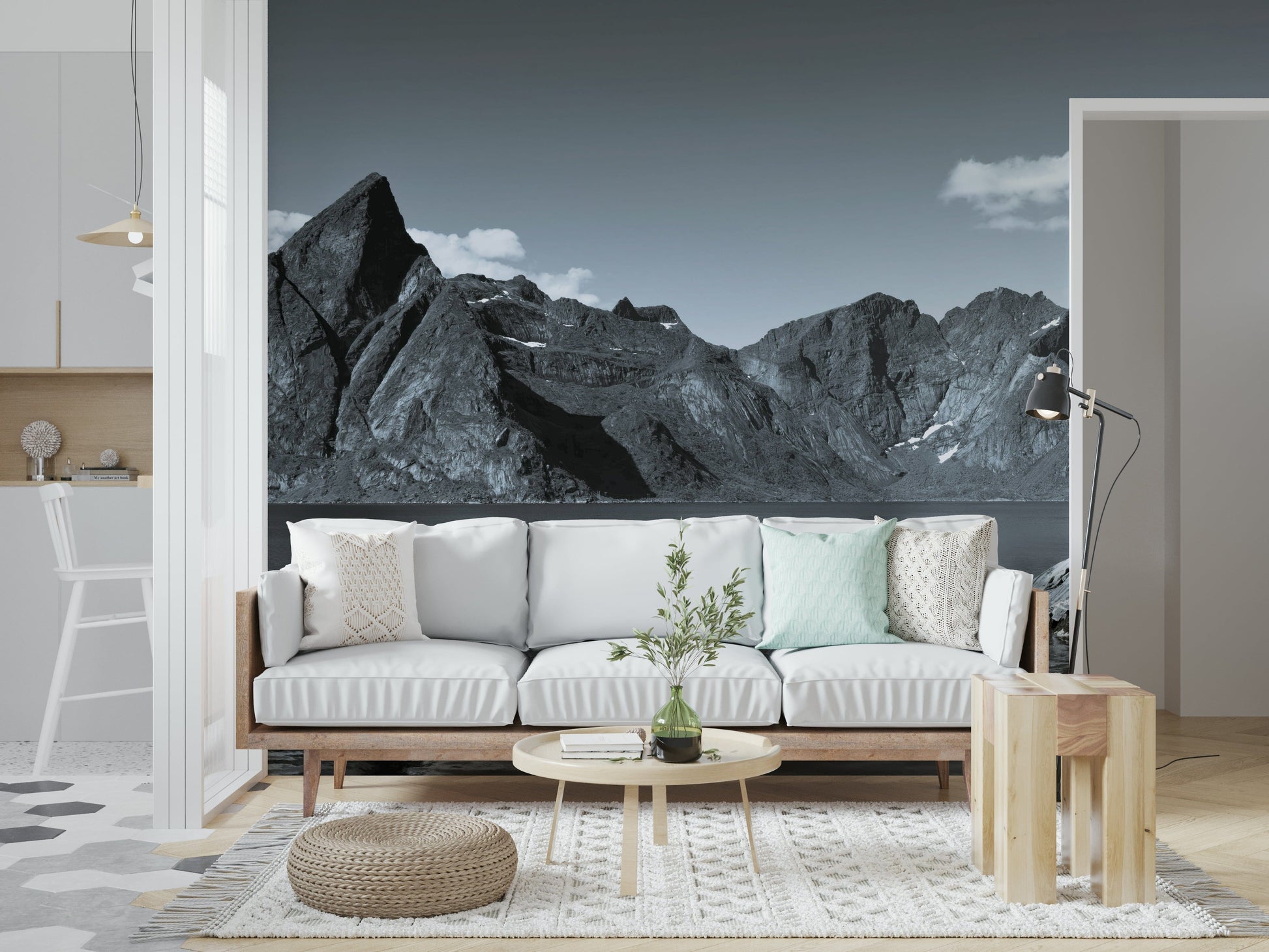 Black-and-white style fjord mural with a contrasting red cabin highlighting the rugged scenery.