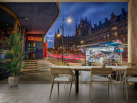 A close-up of the glowing lights of buildings and bridges.