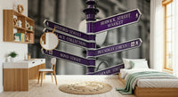 The wallpaper highlights a purple street sign cluster from the Oxford Circus area set against a monochrome urban background.