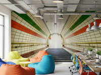 A modern subway corridor wallpaper designed with cream tiles, multicolor stripes, and industrial lighting.