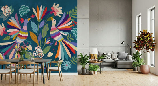 Love Birds mural with two folk-art birds on teal behind a wooden dining table and gray sofa