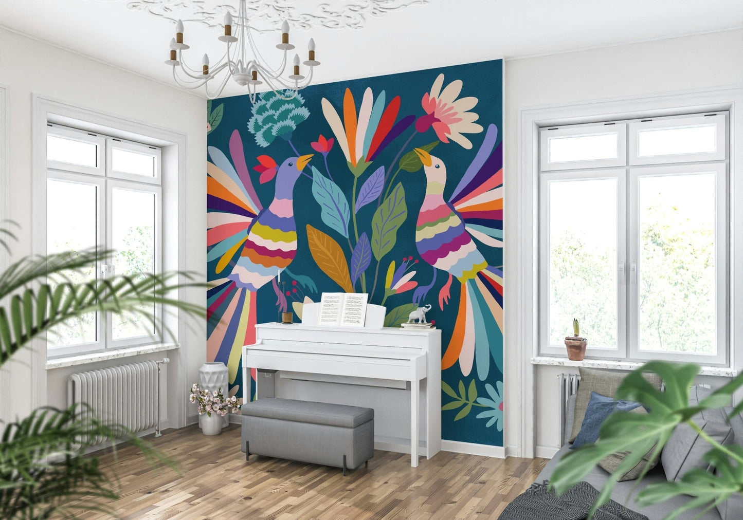 Love Birds mural of two colorful birds on blue behind a white piano in a bright music room