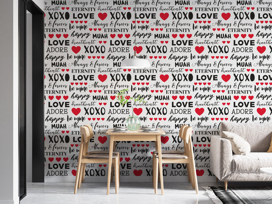 Love Quotes wallpaper mural of black and red love words and hearts behind a light wood dining table and white sofa