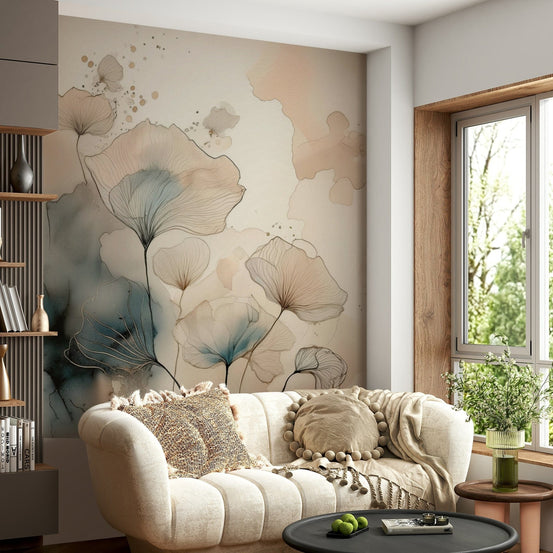 Luminous Botanical Lines wallpaper mural in blue and beige behind a cream tufted sofa in a cosy sunlit living room