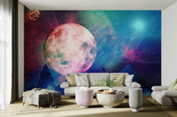 Night sky mural featuring a glowing moon and dark blue mountain silhouettes.