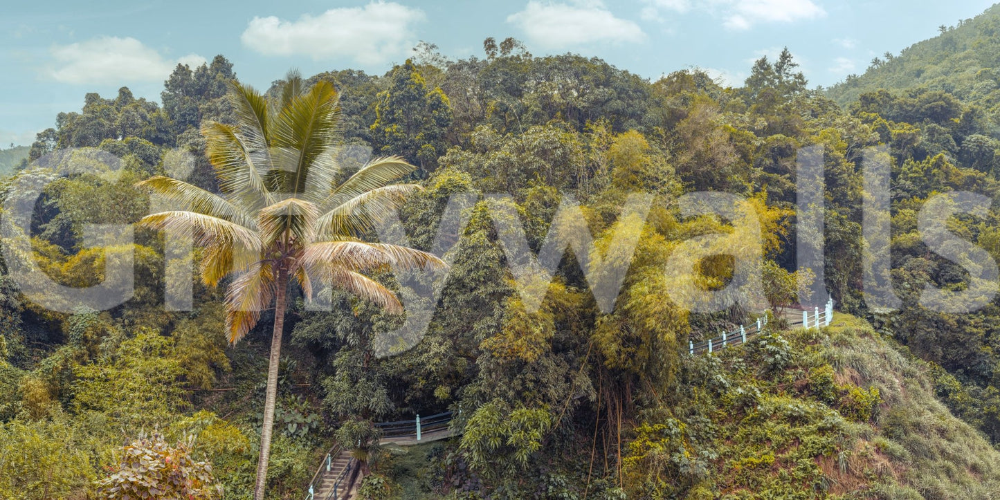 The image shows a serene, tropical mountain landscape.


