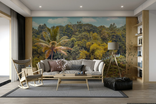 A wall mural of a lush green mountain forest.

