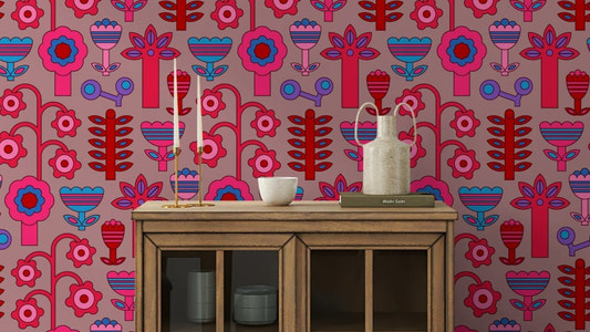 Features stylized flowers with geometric accents.
