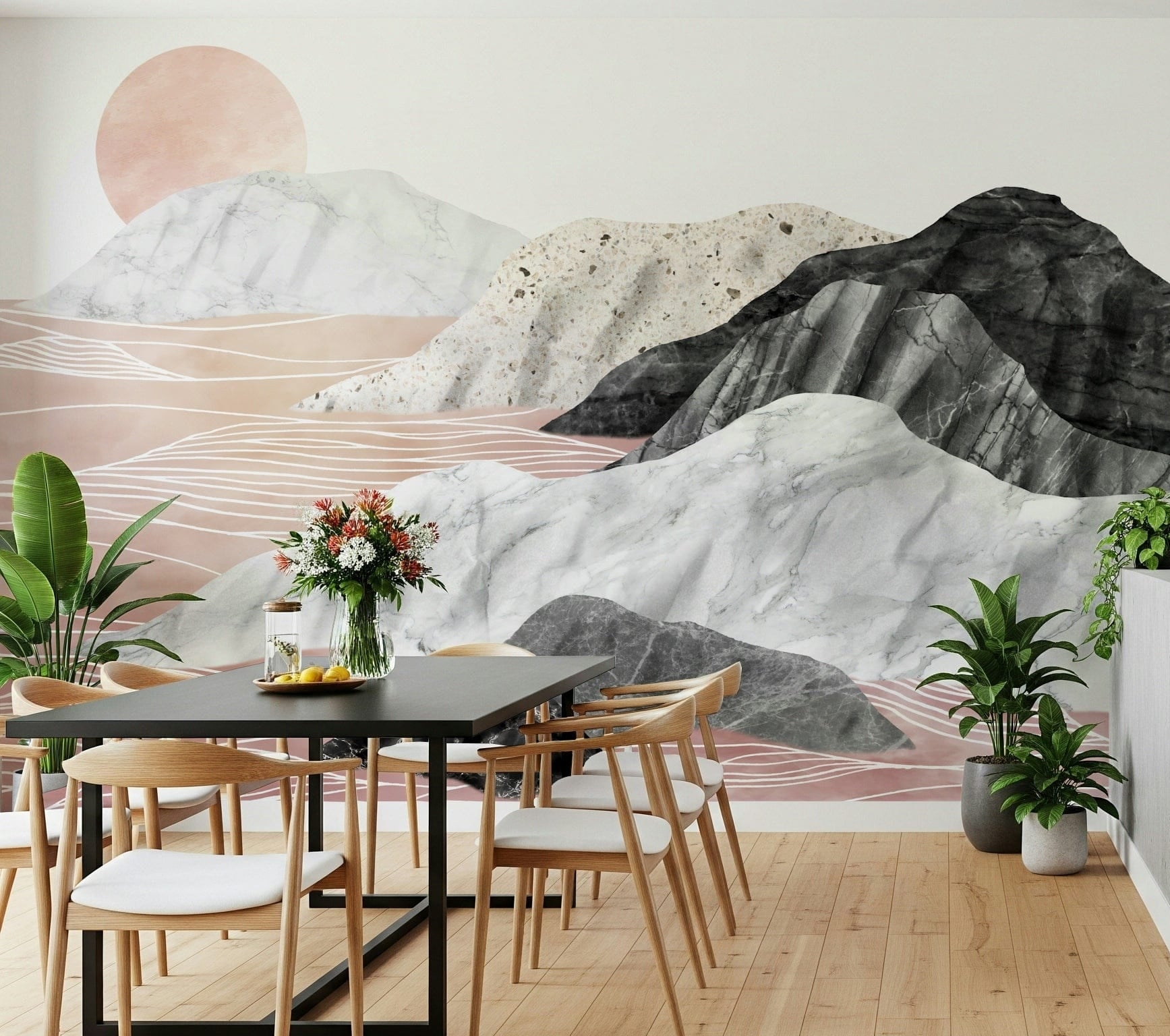 Marble Peaks Sunset wallpaper mural with pink and grey marble mountains behind a black dining table and wood chairs