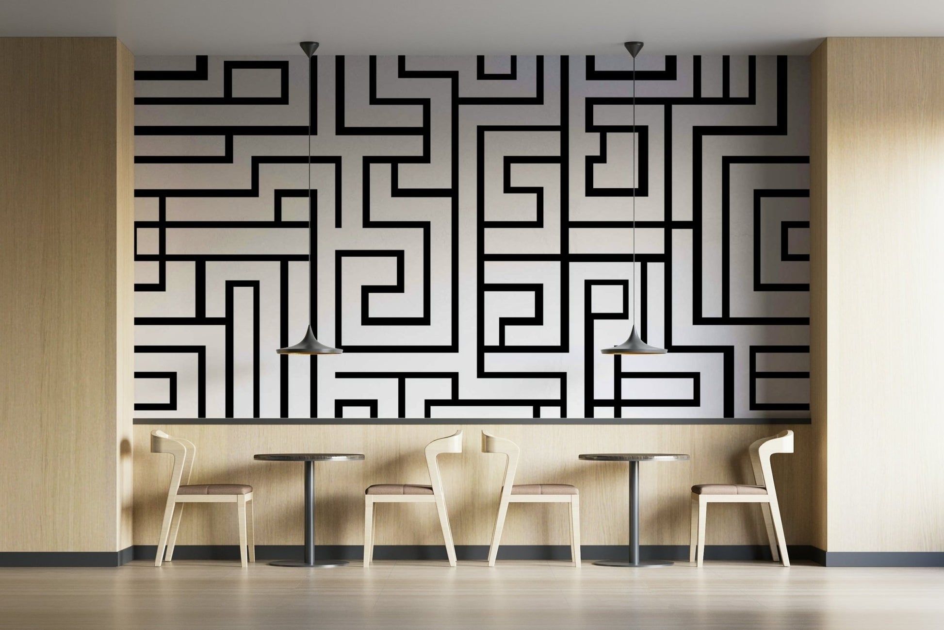 Black maze design on white backdrop
