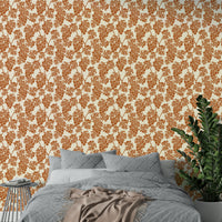 Beige wall mural featuring vineyard and leaf motifs.

