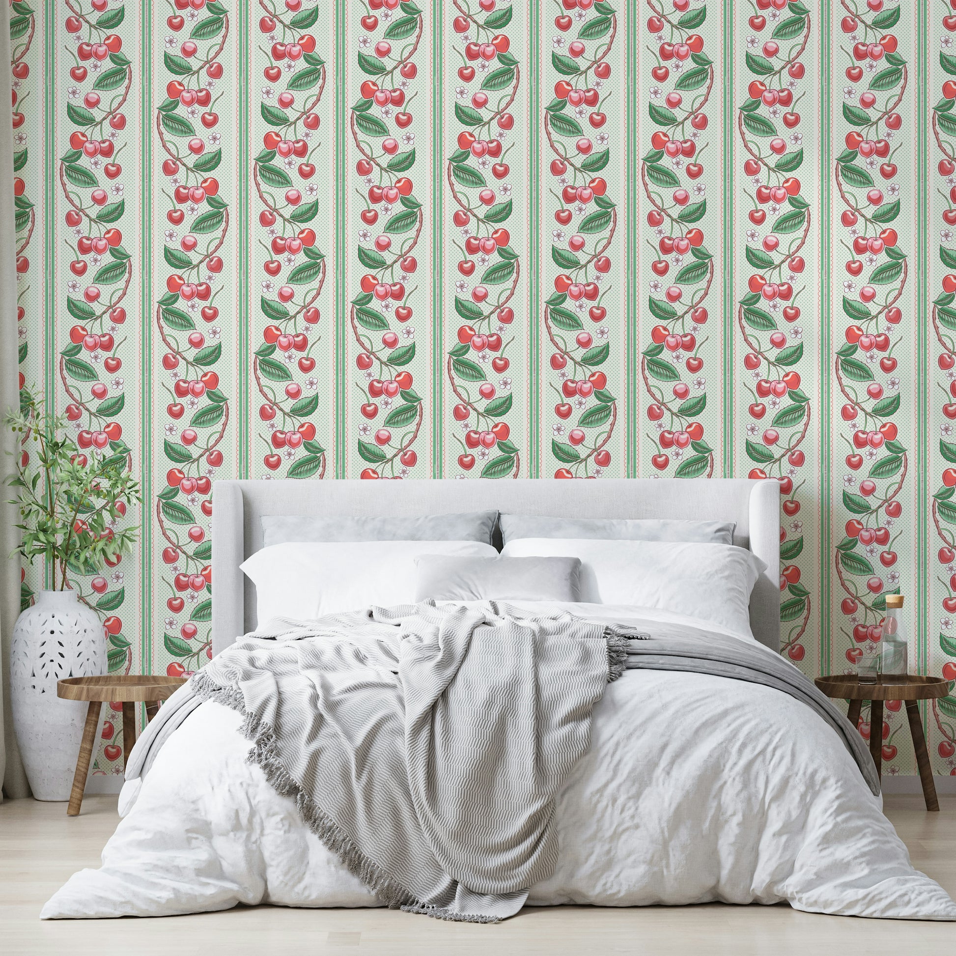 Bold red and green striped wallpaper with playful cherries

