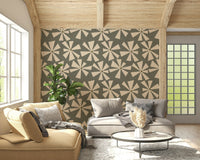 Retro floral wallpaper with abstract pinwheel-style blooms arranged in a scattered pattern.