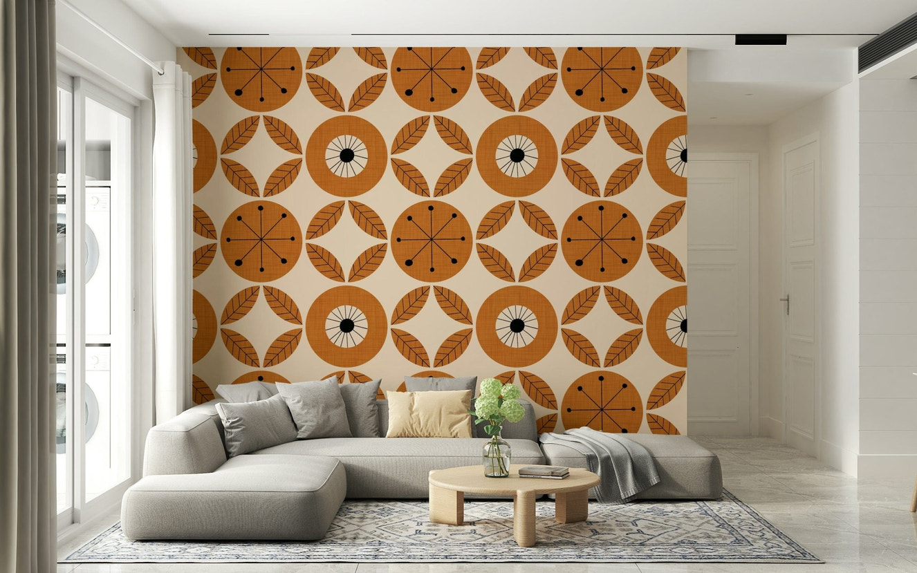 Vintage-inspired wallpaper with repeating orange geometric circles and stylized leaf patterns.