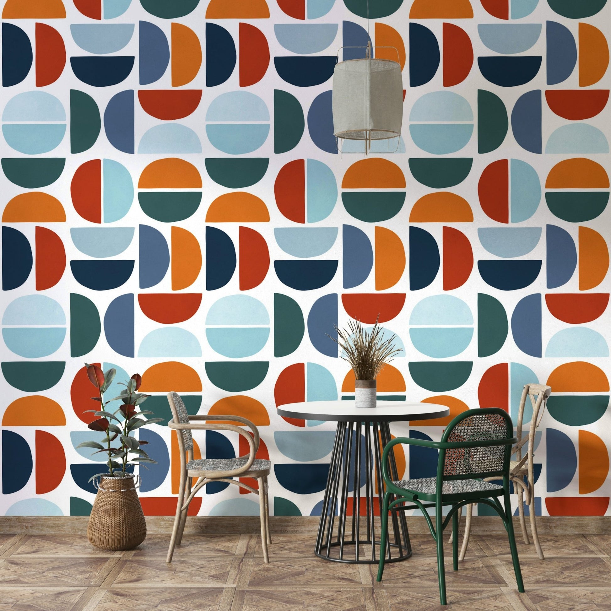 The wallpaper is applied seamlessly, giving the wall a uniform look.

