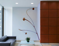 The wallpaper is used as a feature wall in a bedroom.

