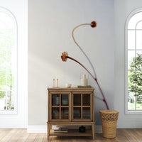 A living room featuring the abstract botanical wall mural.

