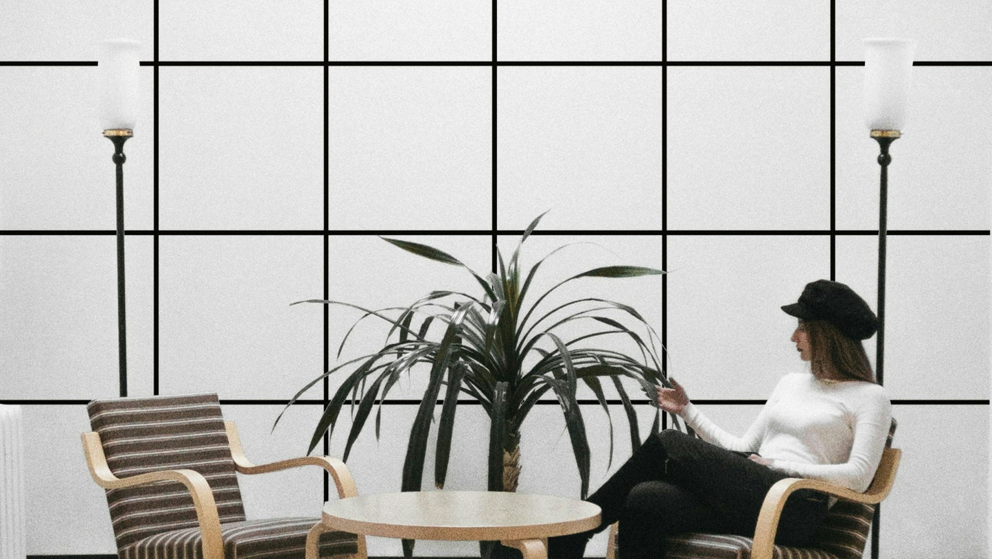 Minimalist Grid Black and White Wallpaper with clean square pattern.

