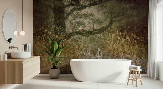 Filtered Light wallpaper mural of an olive meadow and spreading tree behind a freestanding tub and wood vanity