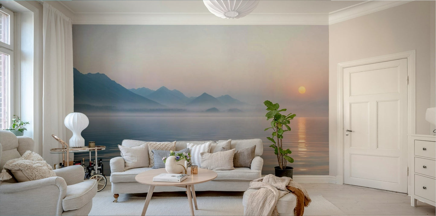 The colors of the sky are a mix of soft orange, pink, and pale gray.
