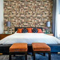 A close-up view shows the fine details of the fluid shapes.

