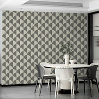 The wallpaper is applied seamlessly, giving the wall a uniform, high-end look.

