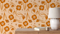 Orange floral wallpaper with peach tones
