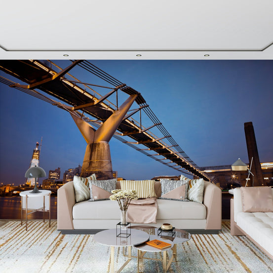 Modern Meets Classic wallpaper mural of the lit Millennium Bridge at dusk above a cream sofa and gold side tables