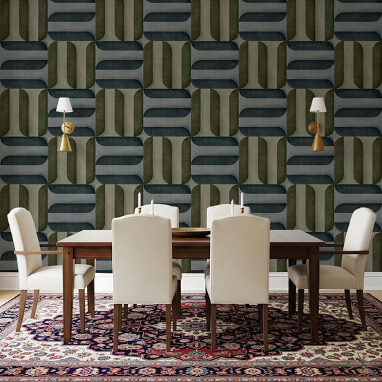 Modern Textured Signs Winter wallpaper in olive and slate geometric shapes behind a wood dining table and cream chairs on a patterned rug