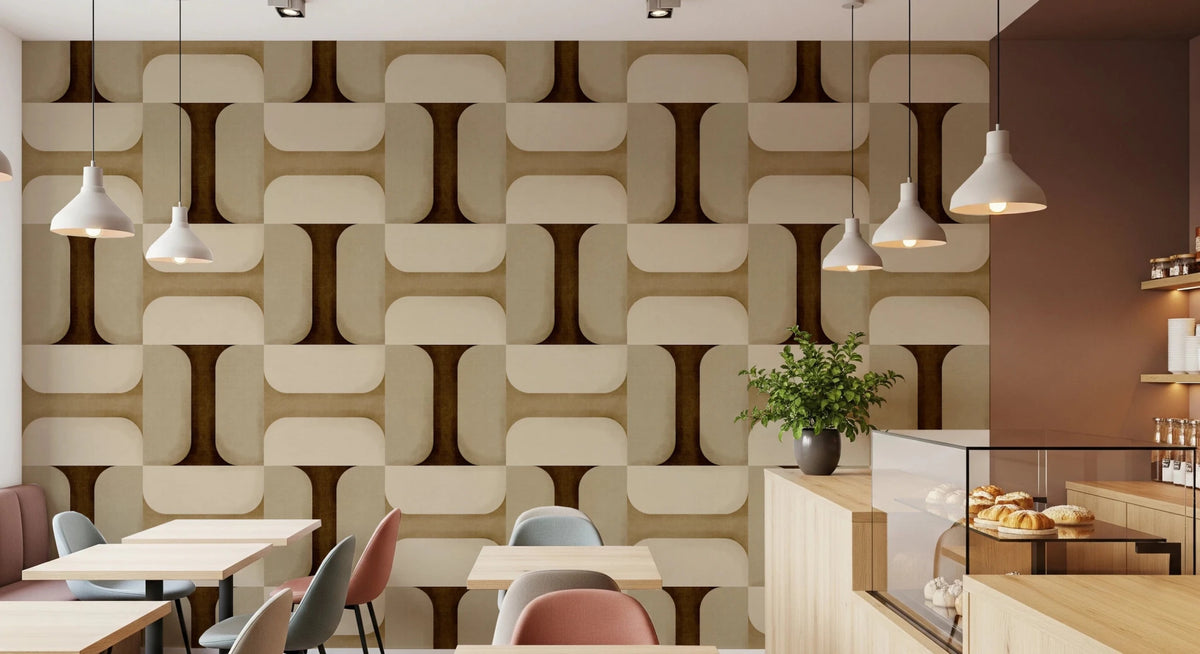 Modern Textured Tiles Earthy wallpaper in brown and cream interlocking pattern behind cafe tables and a pastry counter