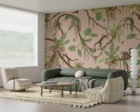 Whimsical mural of monkeys interacting amid lush greenery and tropical foliage