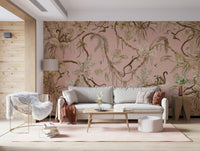Charming jungle-inspired mural with monkeys in a soft pink tropical scene
