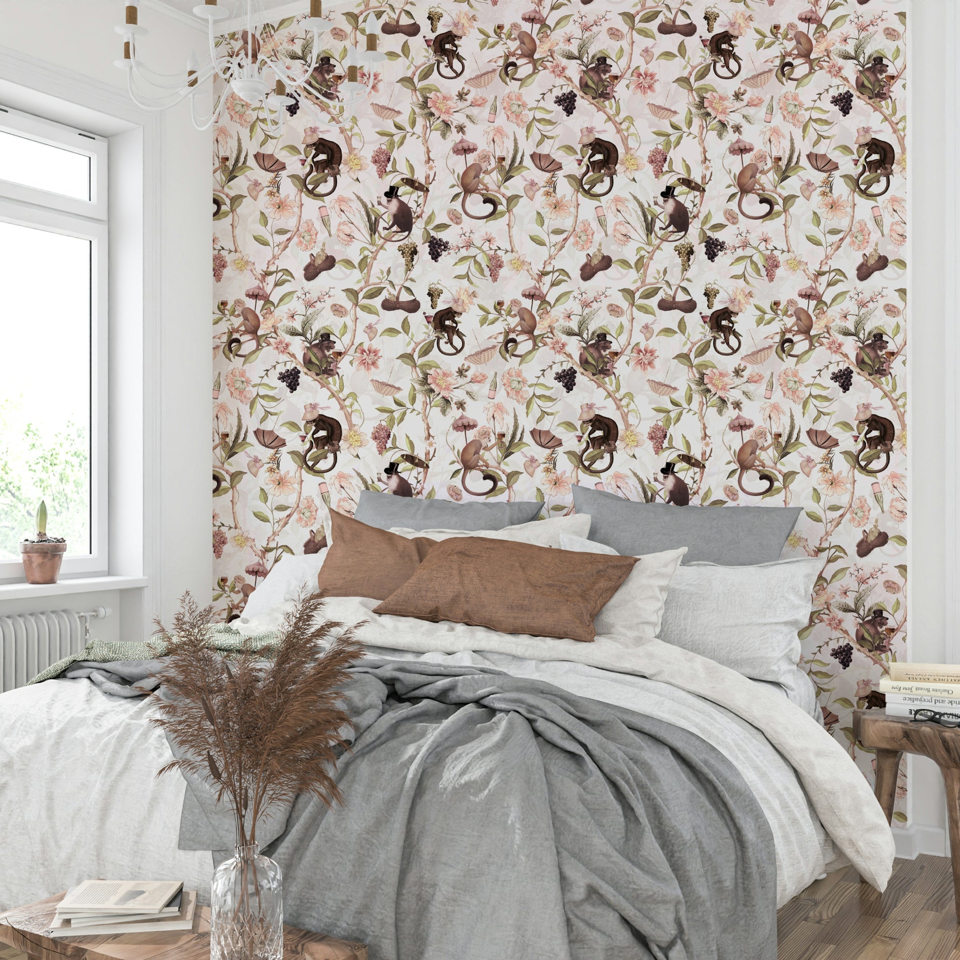 Whimsical wallpaper featuring monkeys among blooming branches.

