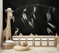 A detailed shot of the delicate leaves and stem against a dark background.

